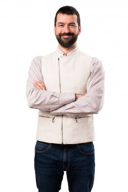 Yakışıklı adam kollarını ile yelek ile izole beyaz arka plan üzerinde çarpı işareti