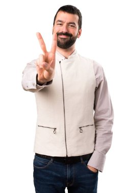 İki izole beyaz zemin üzerine sayma yelek ile yakışıklı adam