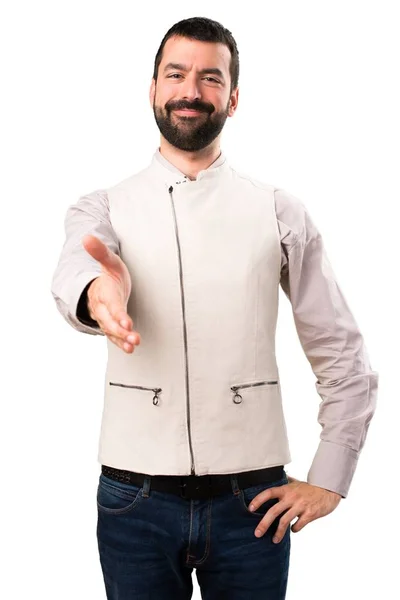 Knappe man met het vest een deal maken op geïsoleerde witte achtergrond — Stockfoto