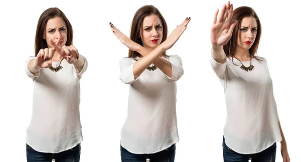 Pretty young girl making NO gesture — Stock Photo, Image