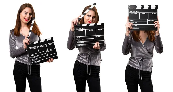 Set of Beautiful young girl holding a clapperboard — Stock Photo, Image