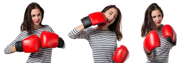 Hübsches junges Mädchen mit Boxhandschuhen — Stockfoto