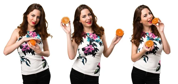 Set of Beautiful young girl holding oranges — Stock Photo, Image