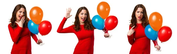 Set de Hermosa jovencita sosteniendo globos y haciendo gesto sorpresa — Foto de Stock
