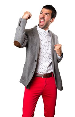 İzole arka plan üzerinde şanslı yakışıklı adam