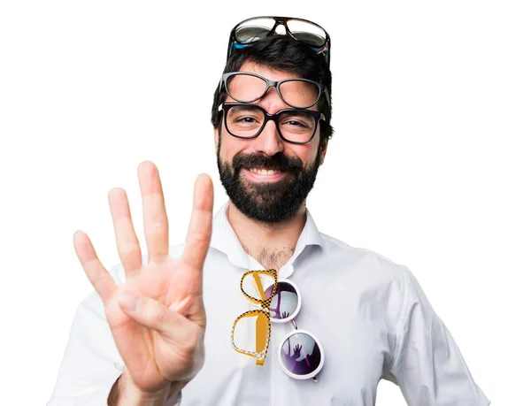 Dört sayma gözlüklü yakışıklı adam — Stok fotoğraf