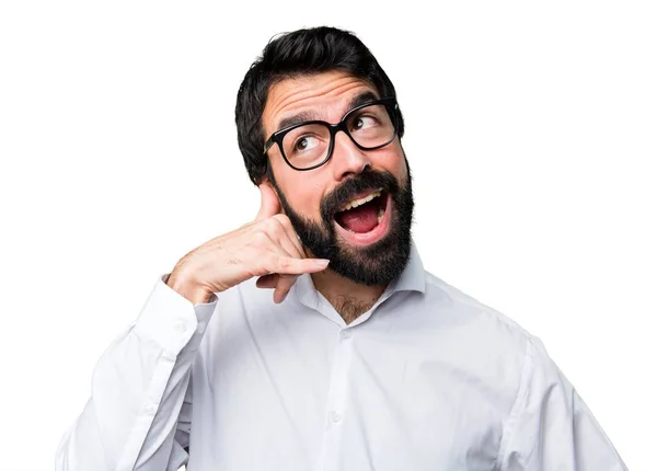 Handsome man with glasses making phone gesture — Stock Photo, Image