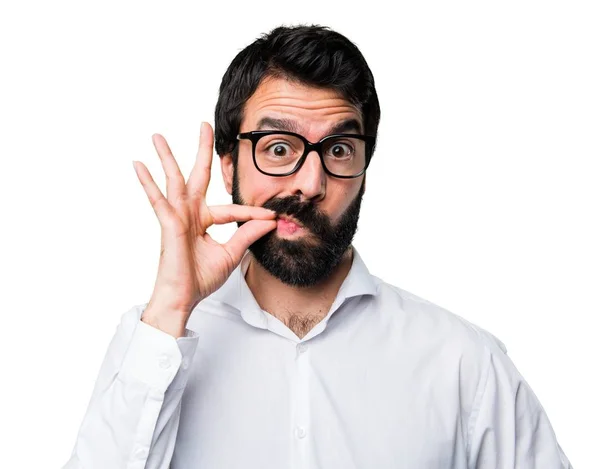 Bărbat chipeș cu ochelari făcând gest de tăcere — Fotografie, imagine de stoc
