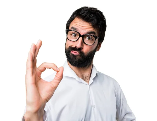 Handsome man with glasses making OK sign — Stock Photo, Image