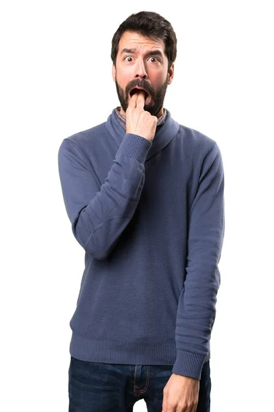 Bello bruna uomo con barba fare vomito gesto su sfondo bianco — Foto Stock