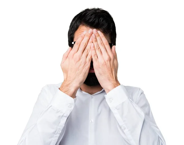 Handsome man with glasses covering his face Stock Photo