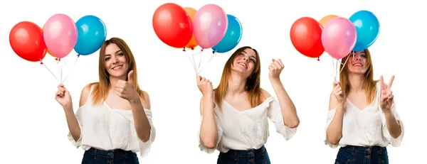 Conjunto de suerte hermosa joven sosteniendo un globo — Foto de Stock