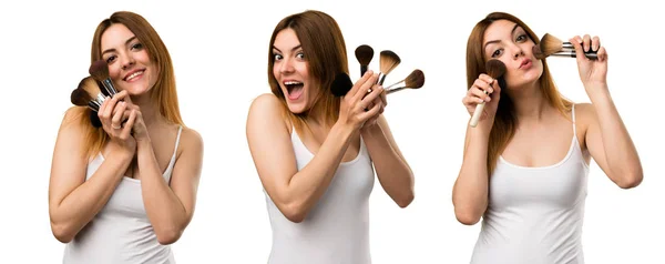 Uppsättning av glada vacker ung flicka med makeup borste — Stockfoto