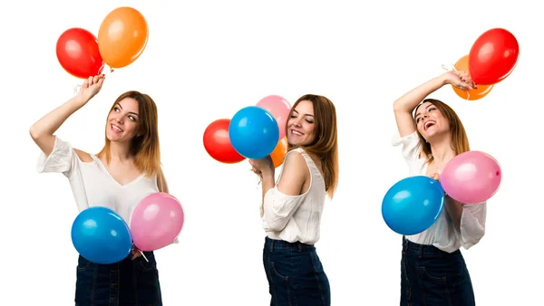 Conjunto de feliz hermosa joven sosteniendo un globo — Foto de Stock
