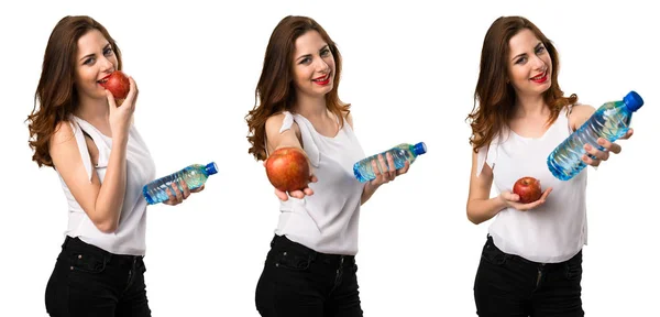 Uppsättning av vacker ung flicka med äpple och vatten — Stockfoto