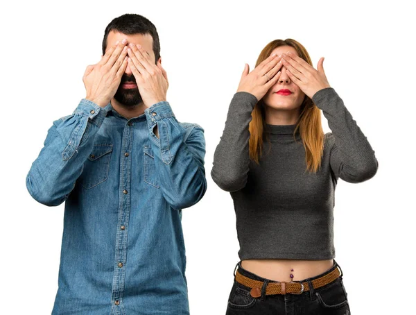 Man and woman covering their eyes — Stock Photo, Image