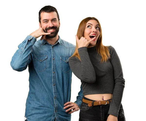 Man and woman making phone gesture — Stock Photo, Image