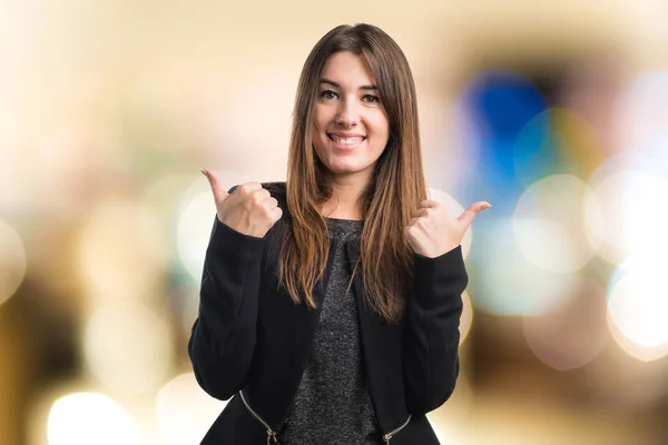 Girl with thumb up — Stock Photo, Image