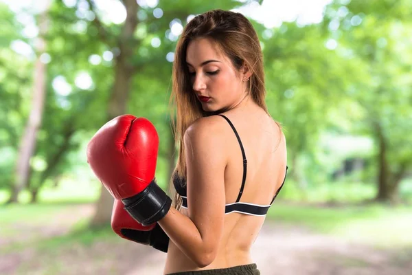 Teen girl with boxing gloves — Stock Photo, Image