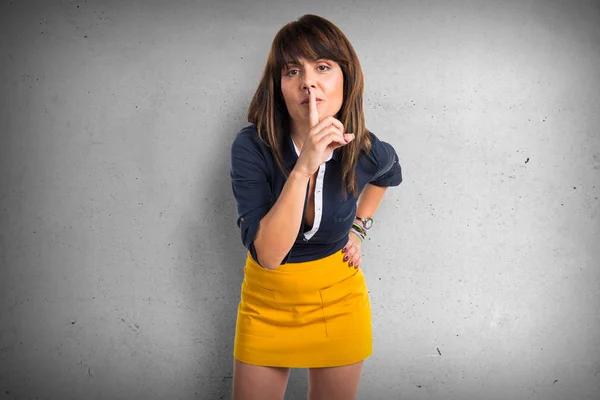 Pretty woman making silence gesture — Stock Photo, Image