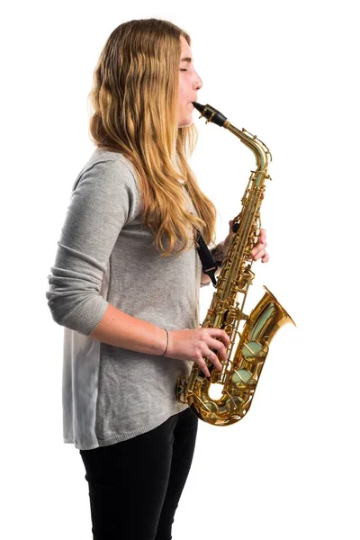 Chica tocando el saxofón —  Fotos de Stock