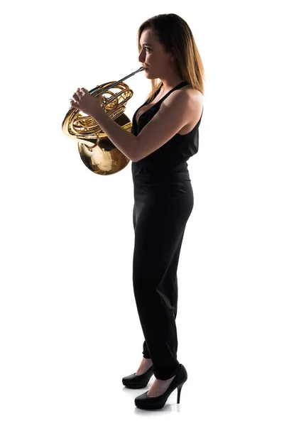 Girl playing the french horn — Stock Photo, Image