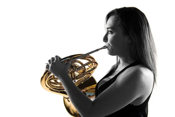 Girl playing the french horn — Stock Photo, Image