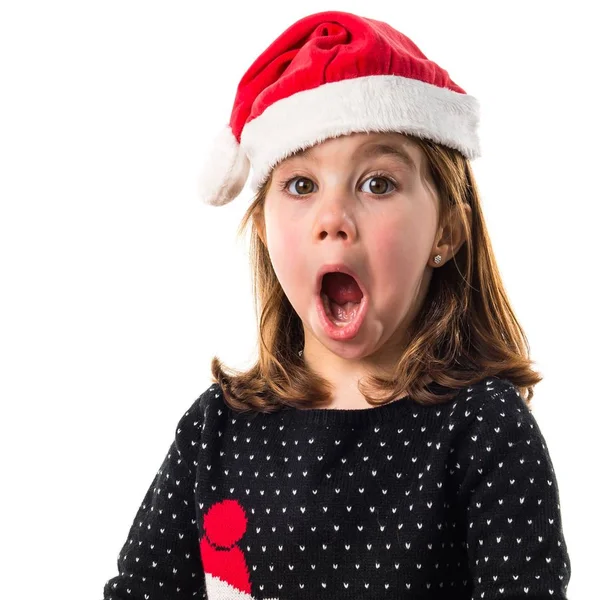 Kid with big red gift doing surprise gesture — Stock Photo, Image