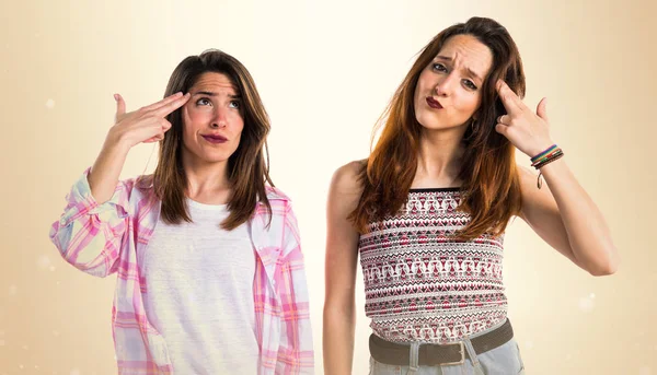 Friends making suicide gesture — Stock Photo, Image