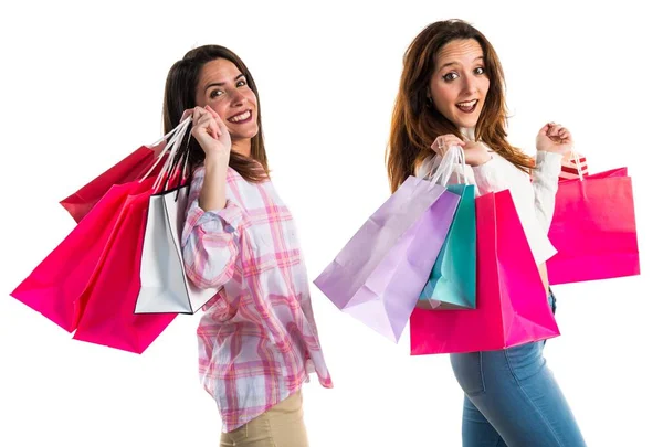 Vrouwen met veel shopping tassen — Stockfoto