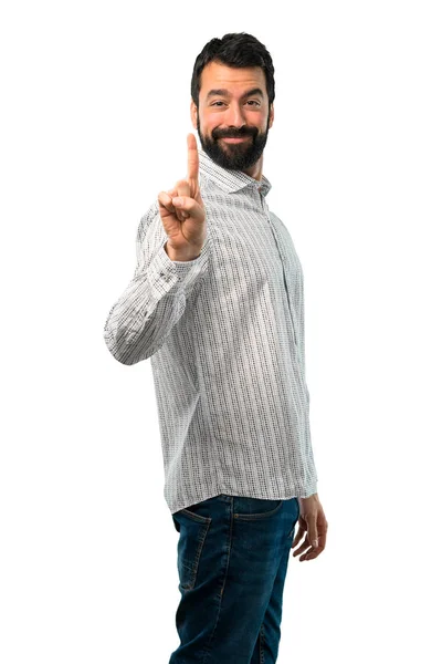 Hombre guapo con barba contando la señal número uno — Foto de Stock