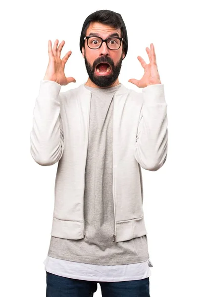Hombre hipster frustrado sobre fondo blanco — Foto de Stock