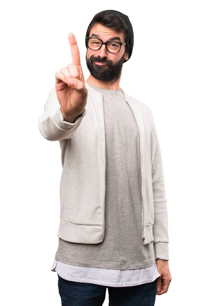 Hipster man counting one on white background — Stock Photo, Image