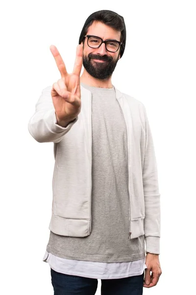 Hipster άνθρωπος μετράει δύο σε λευκό φόντο — Φωτογραφία Αρχείου