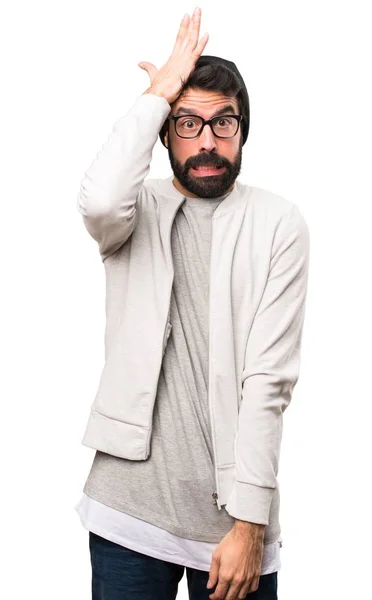 Hipster man having doubts on white background — Stock Photo, Image