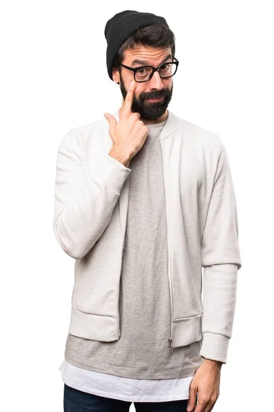 Hipster man showing something on white background — Stock Photo, Image