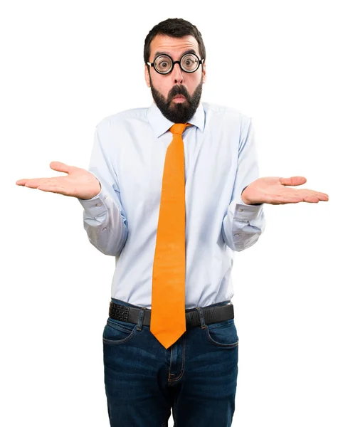 Rolig människa med glasögon gör oviktigt gest — Stockfoto