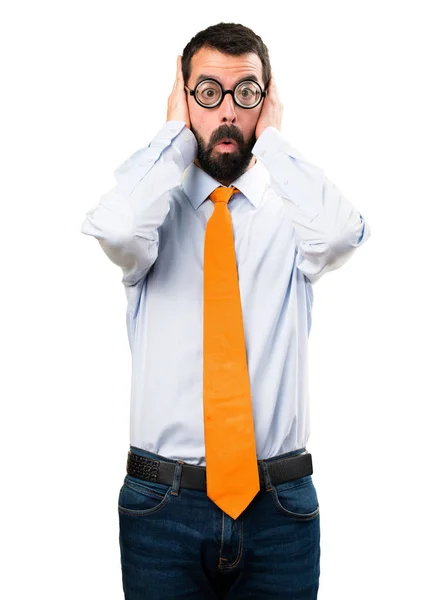 Funny man with glasses covering his ears — Stock Photo, Image
