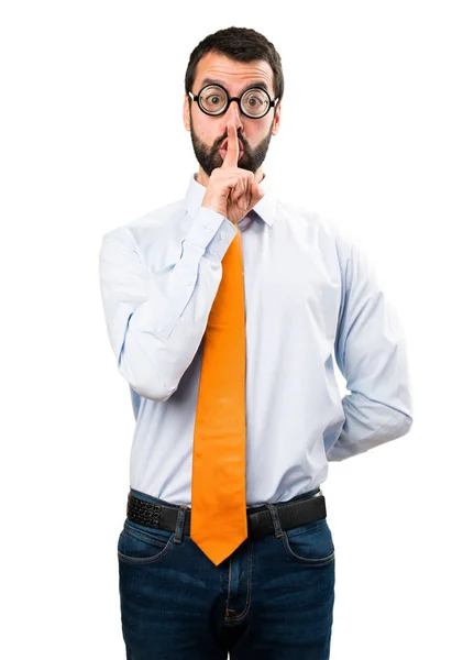 Funny man with glasses making silence gesture — Stock Photo, Image