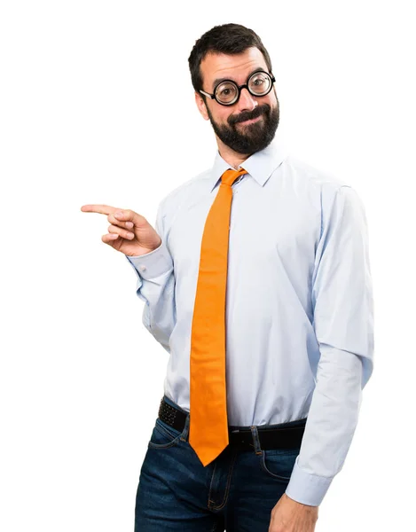 Funny man with glasses pointing to the lateral — Stock Photo, Image