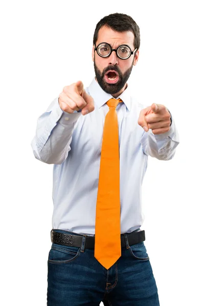 Funny man with glasses pointing to the front — Stock Photo, Image