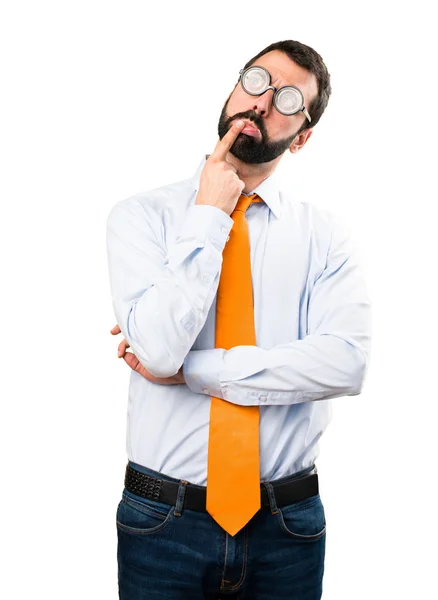Homem engraçado com óculos com dúvidas — Fotografia de Stock