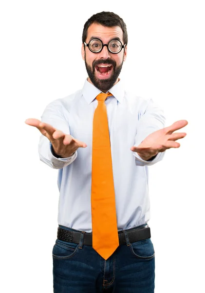 Funny man with glasses presenting something — Stock Photo, Image