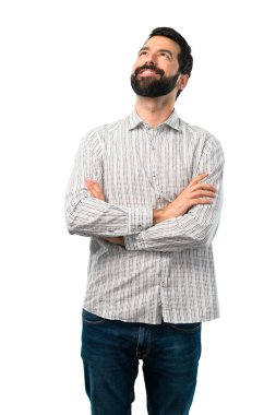 Yakışıklı adam sakal stand ve ararken