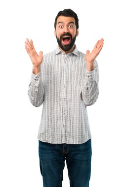 Sürpriz ve şok yüz hızlı sakallı yakışıklı adam