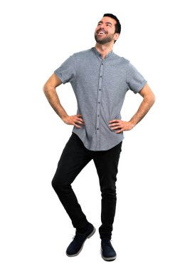 Yakışıklı adam silah, kalça ile poz