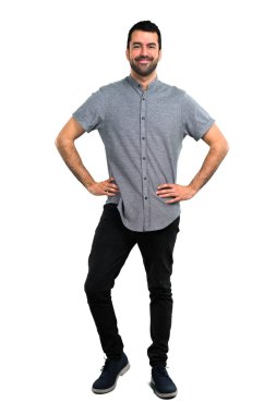 Yakışıklı adam silah, kalça ile poz