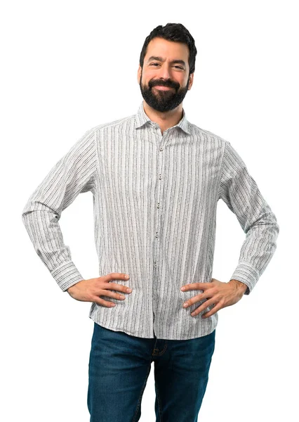 Stilig man med skägg som poserar med armar i höften — Stockfoto