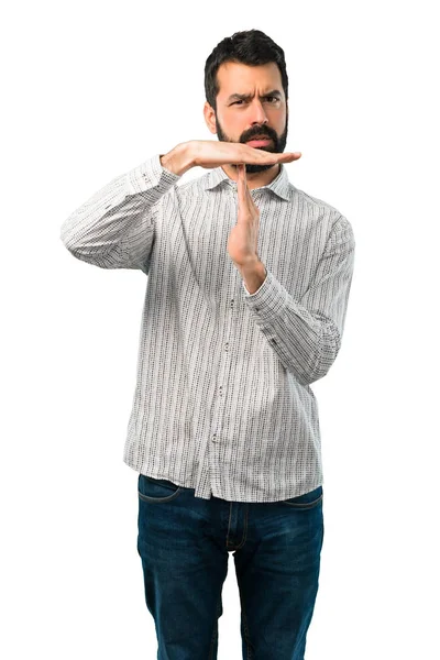 Przystojny mężczyzna z broda podejmowania gest stop z jej strony — Zdjęcie stockowe