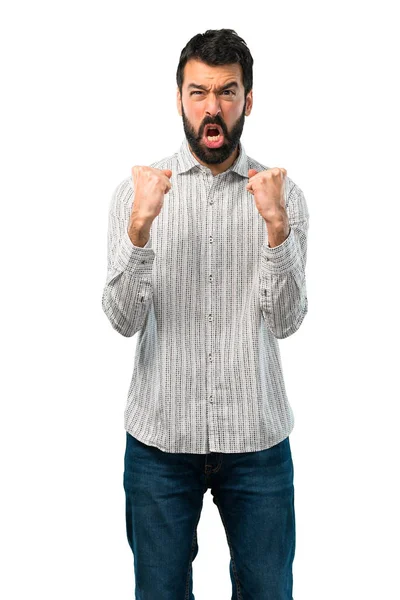 Bonito homem com barba irritado com raiva em gesto furioso — Fotografia de Stock